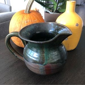 Glazed clay pitcher